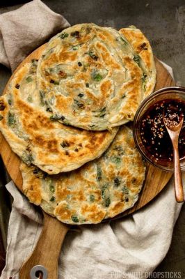  Weihai Sea Cucumber and Scallion Pancakes: An Unexpectedly Harmonious Duet of Coastal Delights?