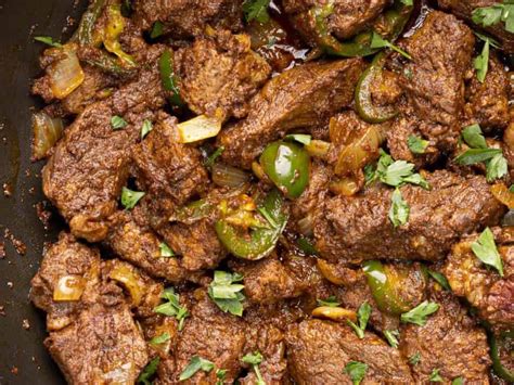  Tibs!  A Flavorful Symphony of Spices and Tender Meat Delighting Your Palate